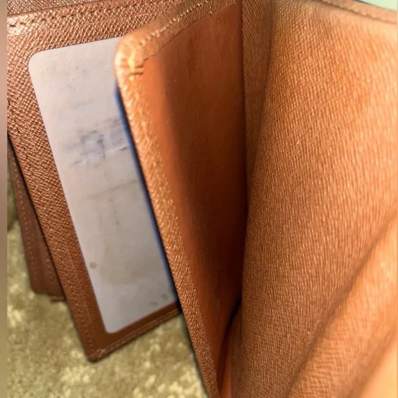 LOUIS VUITTONPortefeuille Alexandre Trifold Wallet w/ Dust Bag.